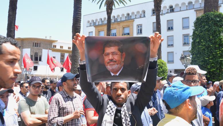 Photo of المغرب.. وفاة مرسي حاضرة بمظاهرة مناهضة لورشة المنامة